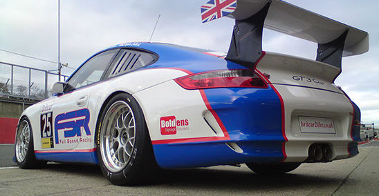 Porsche wrapped in blue and red for Full Speed Racing.