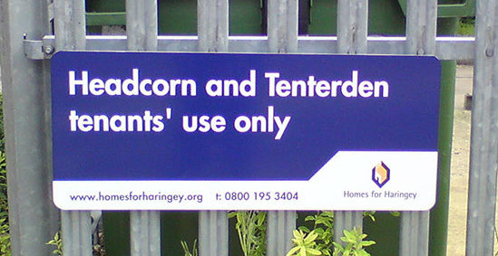 Information Sign mounted to tri point fence for Homes for Haringey.