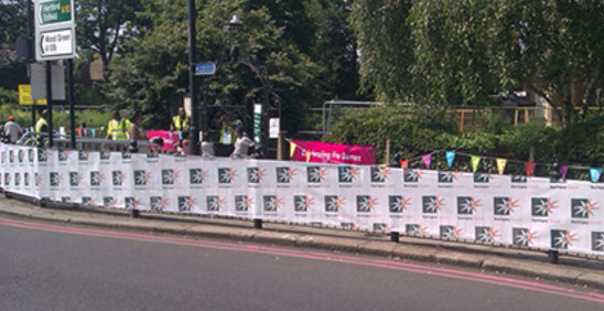 Printed mesh banner to celebrate the Olympic torch passing through Haringey