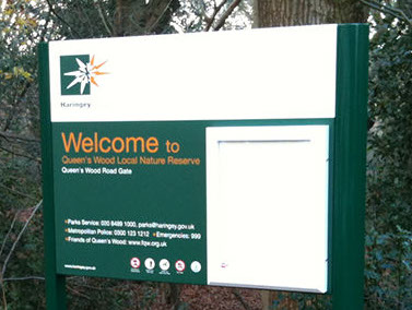 Information sign with lockable poster case.