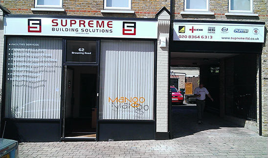 Main fascia and window graphics for Supreme Building Solutions.